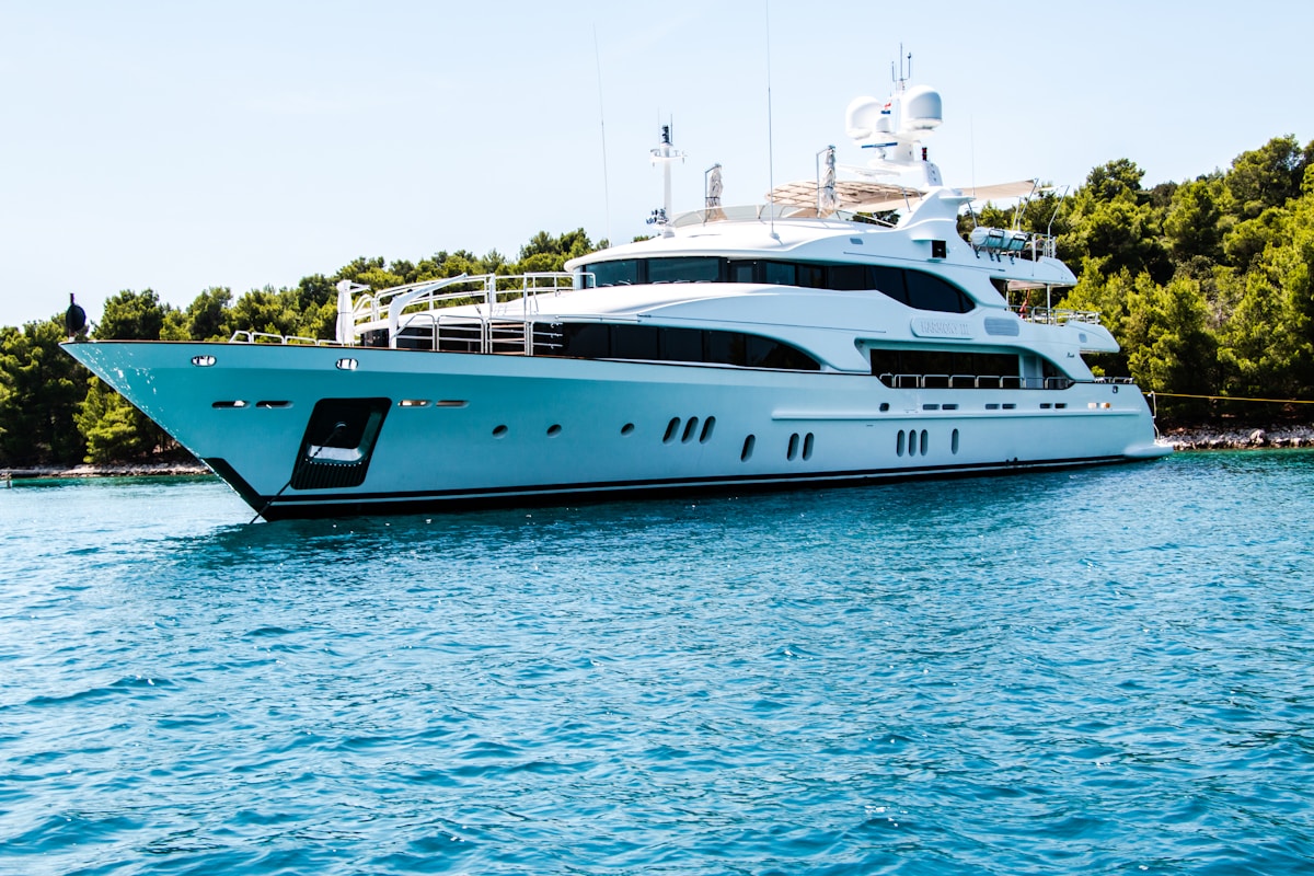 Luxury yacht cruising on turquoise waters